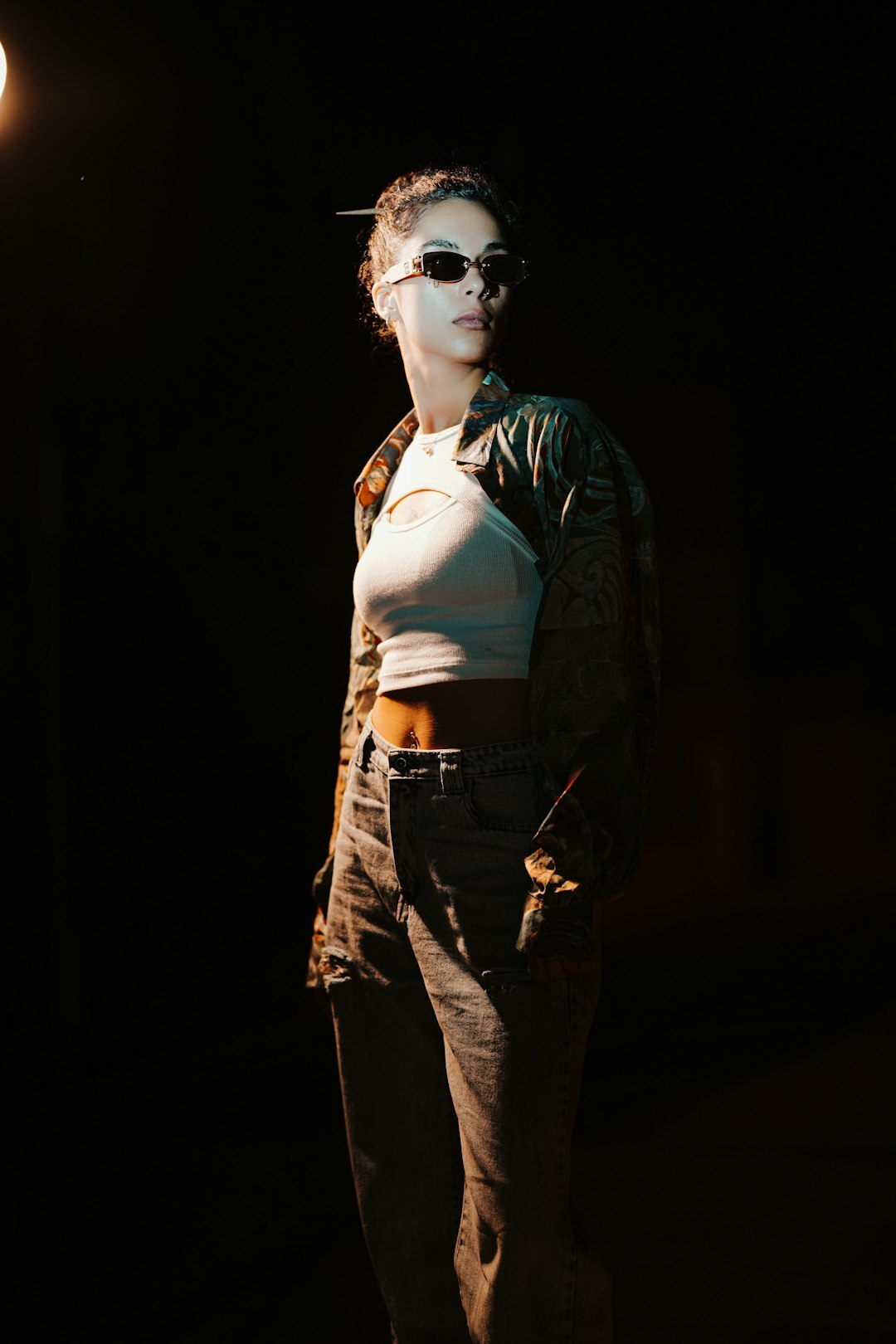 Vintage fashion runway show with dramatic lighting